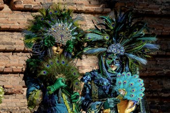 The parade of people in costume at the 2026 Venice Carnival in Campo San Lorenzo.