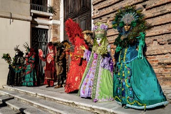 The parade of people in costume at the 2026 Venice Carnival in Campo San Lorenzo.
