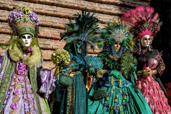 Venice carnival costumed figures
