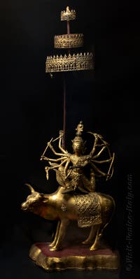 10-armed divinity astride a bull (Southeast Asia)