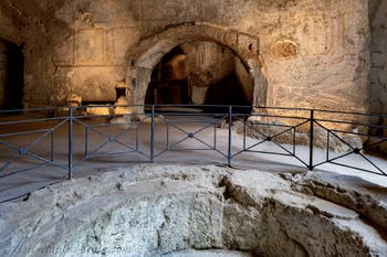 The baptismal font of the Bishopric of Paul II, in the Catacombs of San Gennaro in Naples, Italy