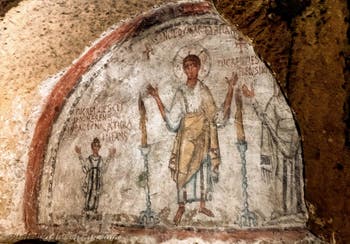 Fresco depicting San Gennaro with Nicaziola and Cominia, in the Catacombs of San Gennaro in Naples, Italy