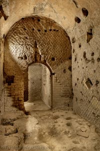A Taberna or shop in the underground Neapolis district beneath the Basilica of San Lorenzo Maggiore in Naples, Italy